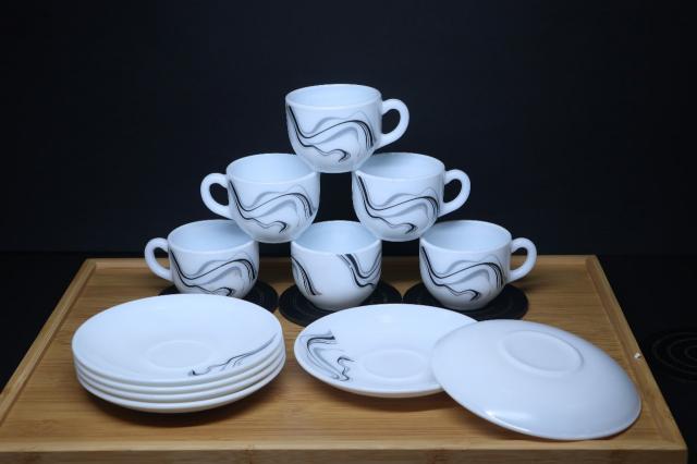 MG Elegant Black Ripple Cup & Saucer Set Modern Swirl Design wholesale of kitchen products in Surat